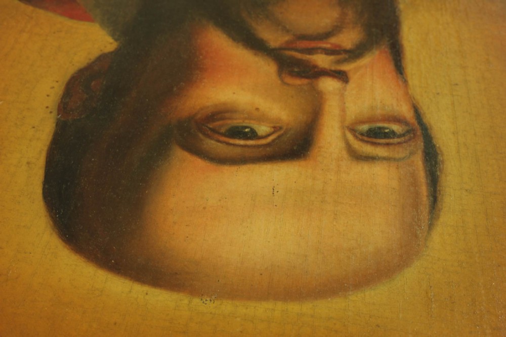 An 18th-century Italian oil painting depicting Saint Francis de Sales with folded hands and a luminous halo against a dark background. View X
