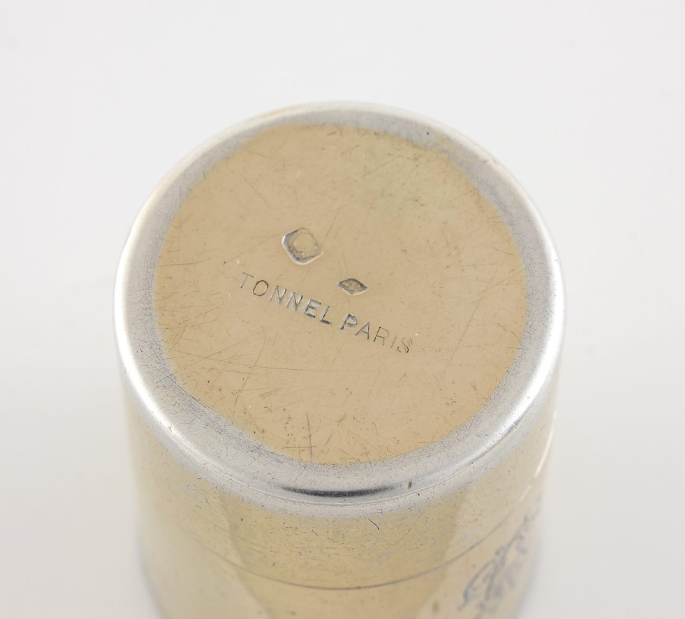 A cylindrical clear glass flask featuring spiral fluting, topped with a domed silver cap and a silver base bearing an engraved monogram. View VIII
