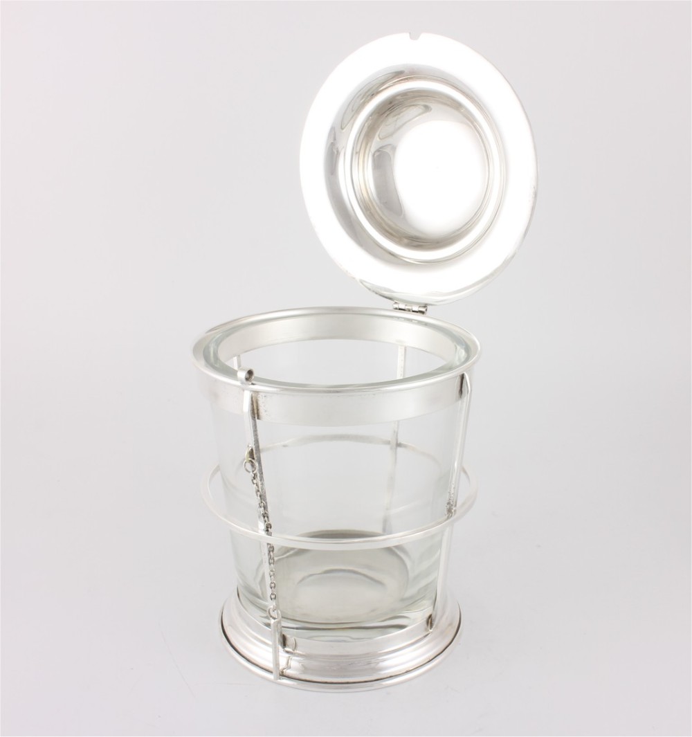 A silver-plated and clear glass ice bucket designed in the form of a nautical ships lantern with a removable lid and chain detail. View III