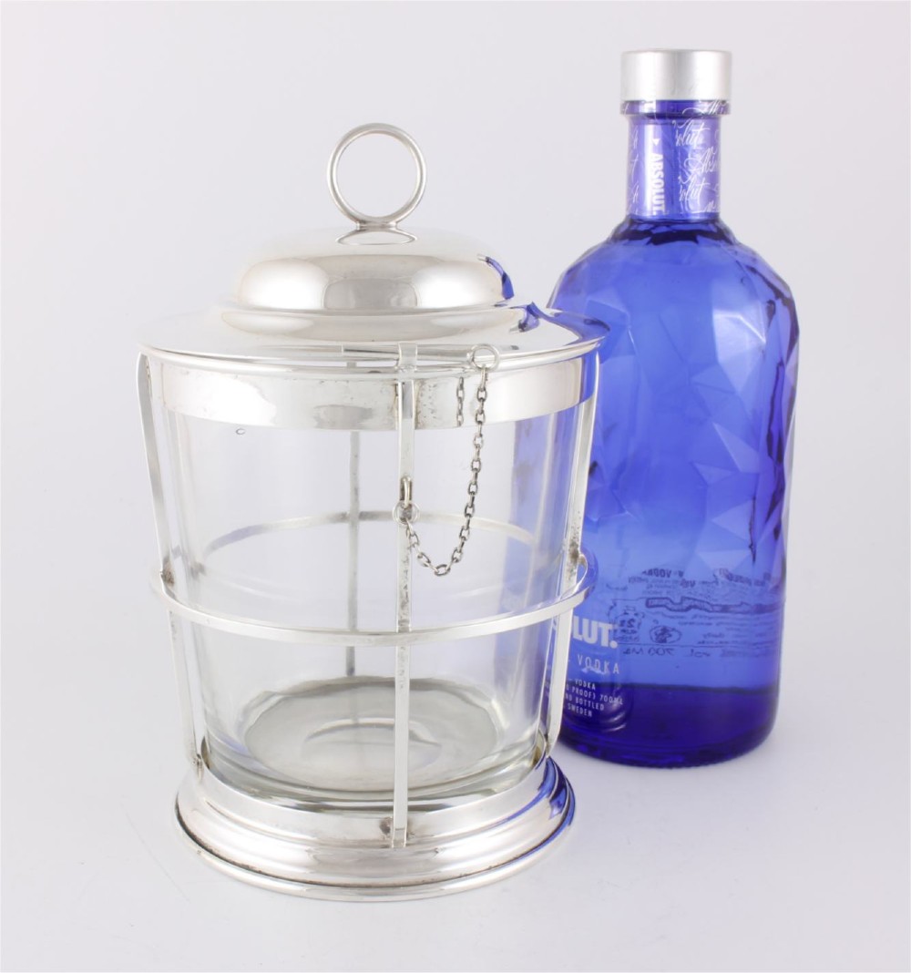 A silver-plated and clear glass ice bucket designed in the form of a nautical ships lantern with a removable lid and chain detail. View XIII