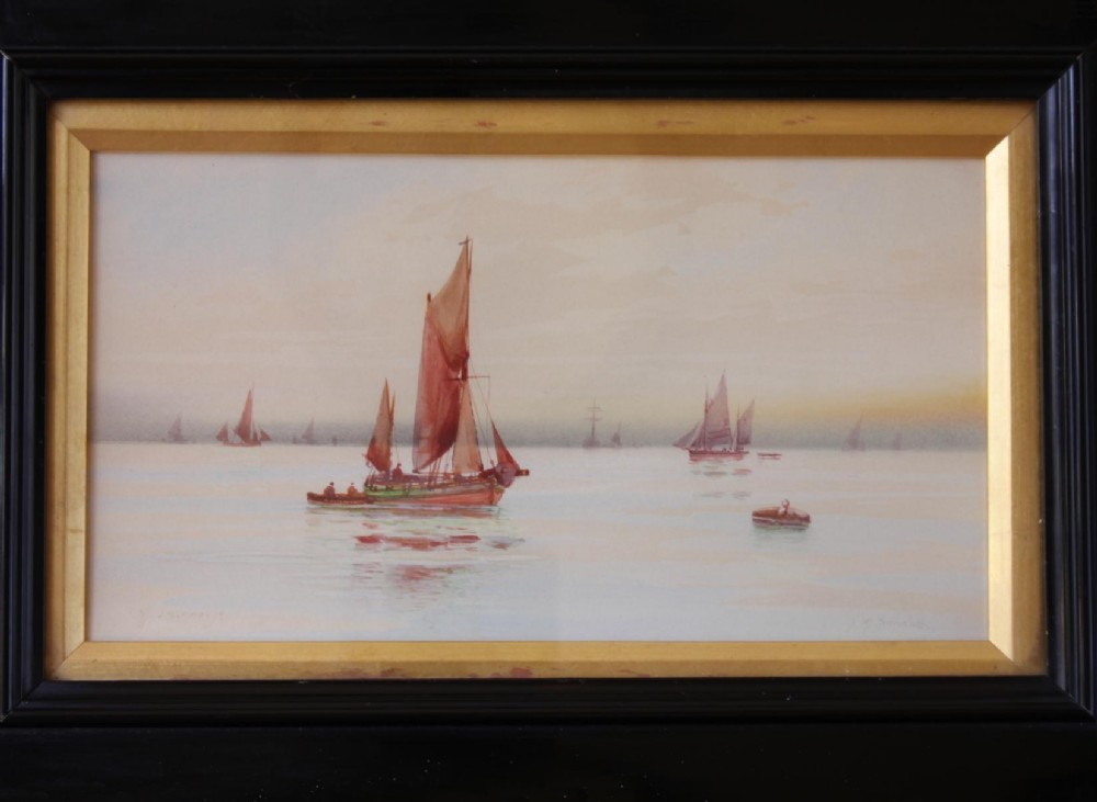 A framed early twentieth-century watercolour painting featuring red-sailed fishing boats on calm waters off Scarborough, enclosed in a thick black frame with a gold inner slip. View II