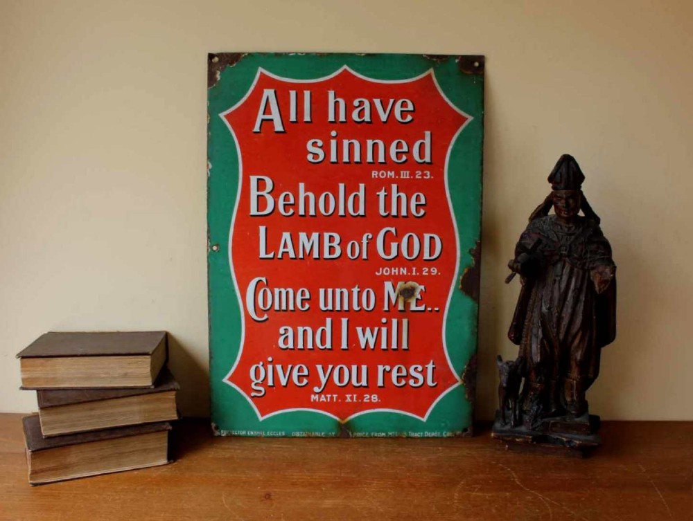 A rectangular vitreous enamel sign with a green background and a red central cartouche displaying white and black printed scripture texts. View II