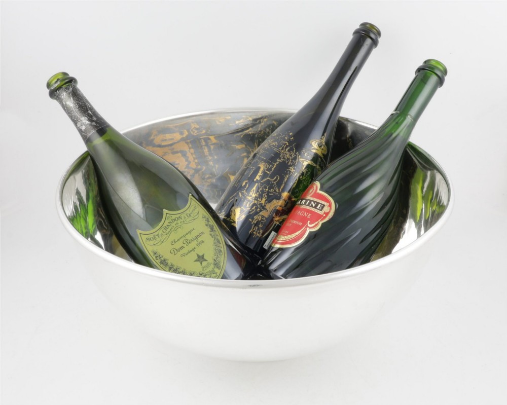 A large polished silver-plated champagne cooler bowl featuring a smooth circular basin, rolled rim, and pedestal base. View XIII