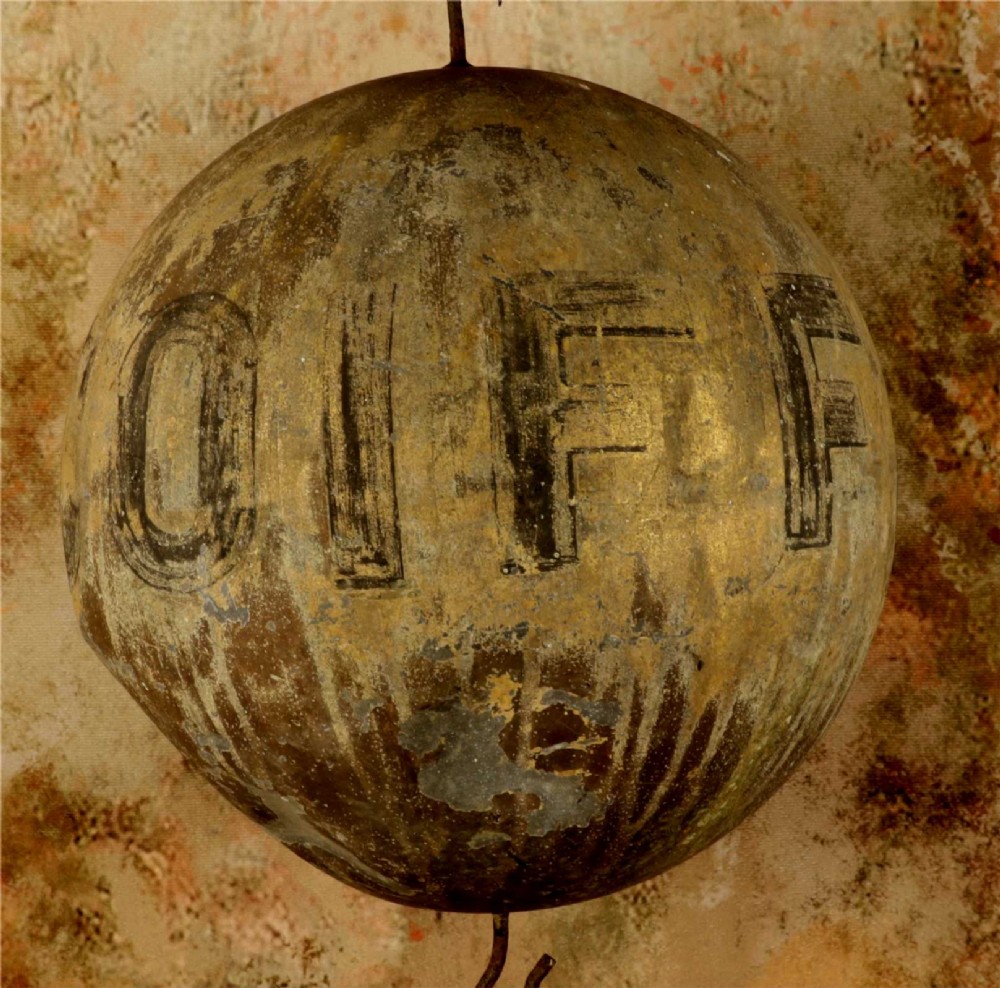 A 19th-century spherical zinc French coiffeur trade sign featuring hand-painted lettering and iron hanging hooks. View V