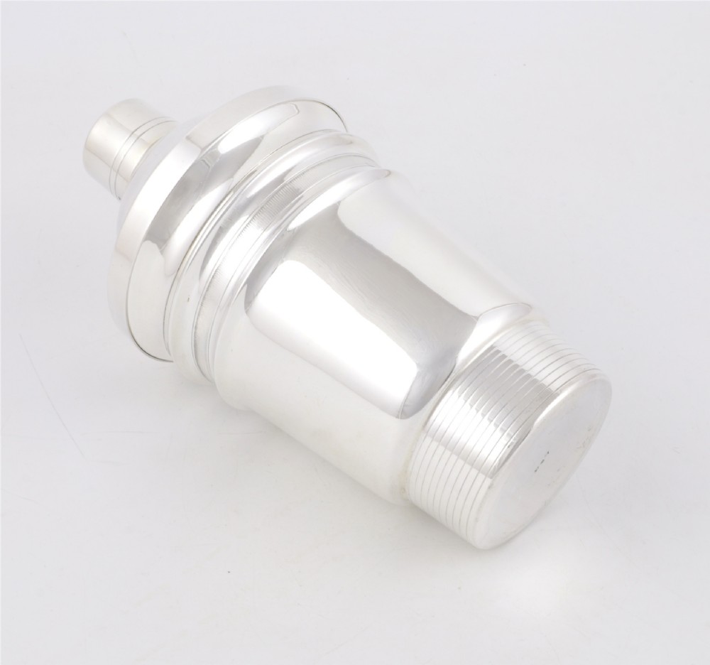 A 1930s Art Deco silver-plated cocktail shaker featuring stepped geometric contours and fine engine-turned band details. View III