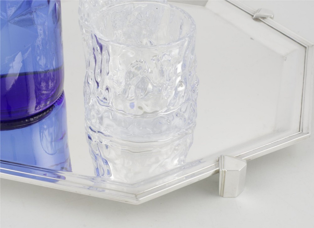 An octagonal silver-plated Art Deco cocktail tray featuring geometric corner accents and a polished smooth surface. View V