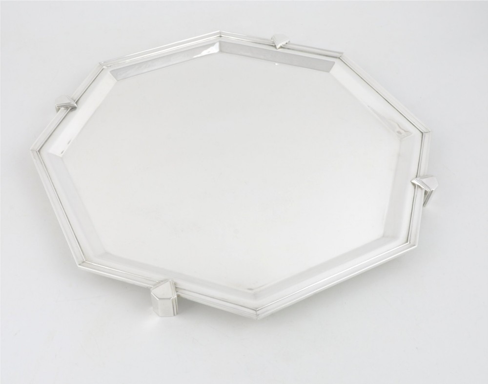 An octagonal silver-plated Art Deco cocktail tray featuring geometric corner accents and a polished smooth surface. View VII