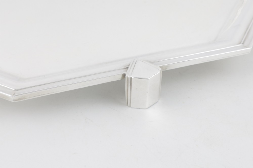 An octagonal silver-plated Art Deco cocktail tray featuring geometric corner accents and a polished smooth surface. View VIII