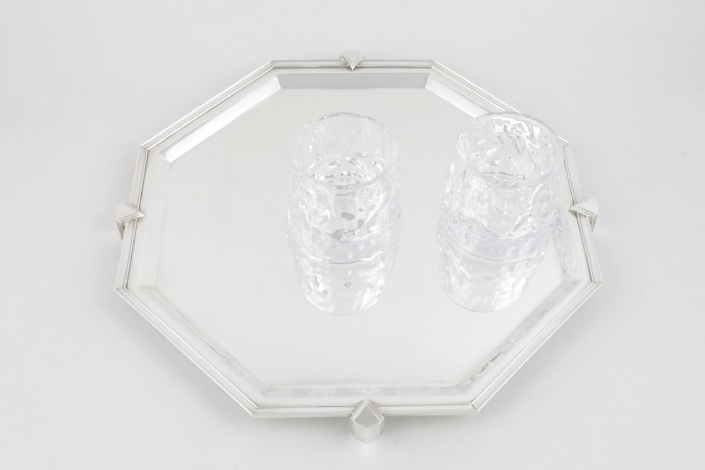 An octagonal silver-plated Art Deco cocktail tray featuring geometric corner accents and a polished smooth surface. View IX