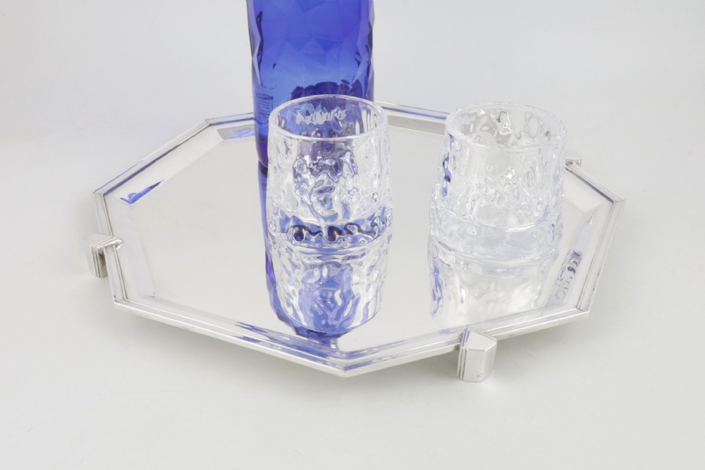 An octagonal silver-plated Art Deco cocktail tray featuring geometric corner accents and a polished smooth surface. View XII