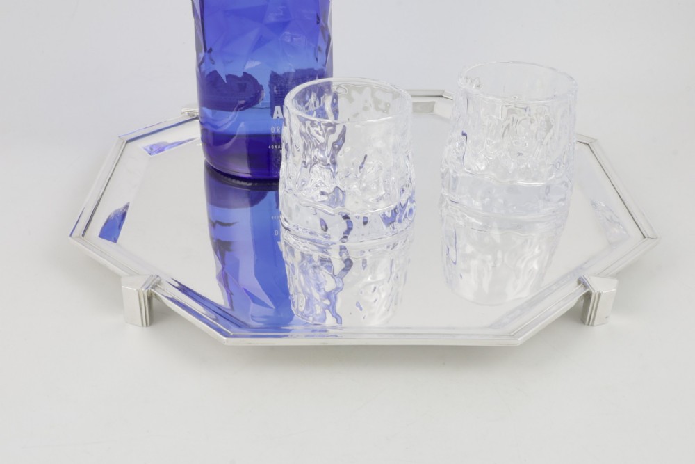 An octagonal silver-plated Art Deco cocktail tray featuring geometric corner accents and a polished smooth surface. View XIV