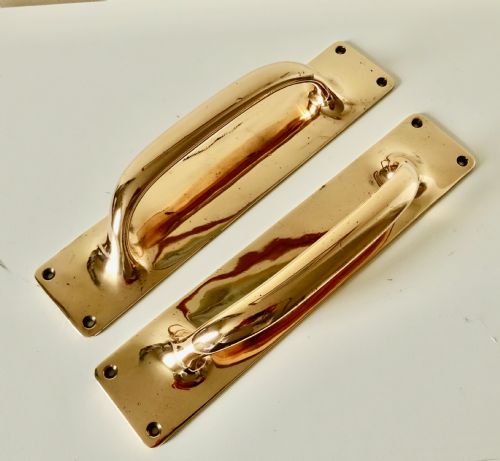 A Pair of Large Bronze Door Handles