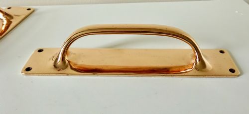 fig 1. A PAIR OF LARGE BRONZE DOOR HANDLES
