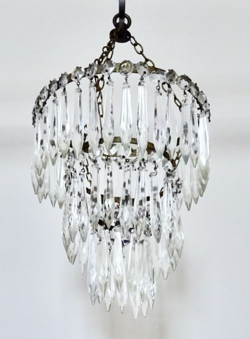 A Three Tier Glass Drop Ceiling Light