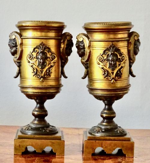 A Pair of Victorian Bronze Cherub Vases