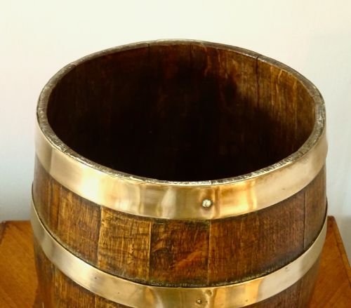 fig 1. AN OAK COOPERED BARREL WITH BRONZE BANDING