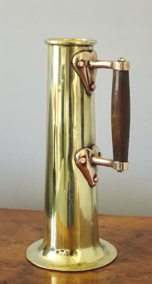 A Brass and Bronze Hydrometer Jug