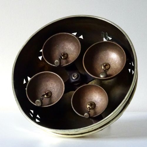 fig 1. ALTAR BELLS IN A DECORATIVE BRASS COVER