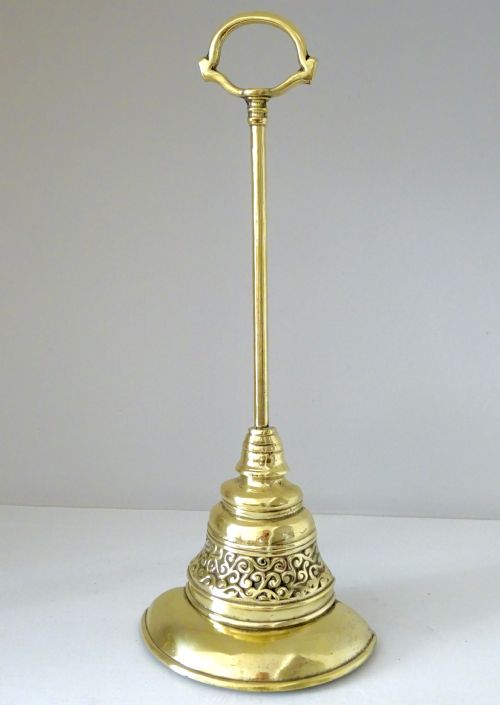 A Tall Brass Doorstop