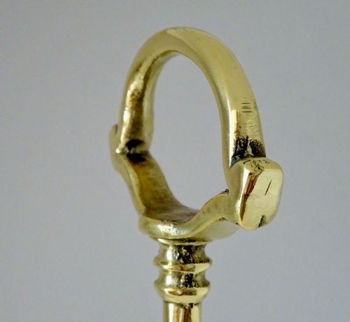 fig 1. A TALL BRASS DOORSTOP