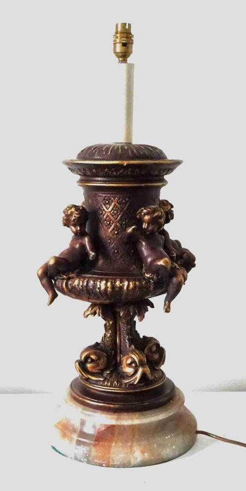 1910 A LARGE CHERUB AND DOLPHIN LAMP