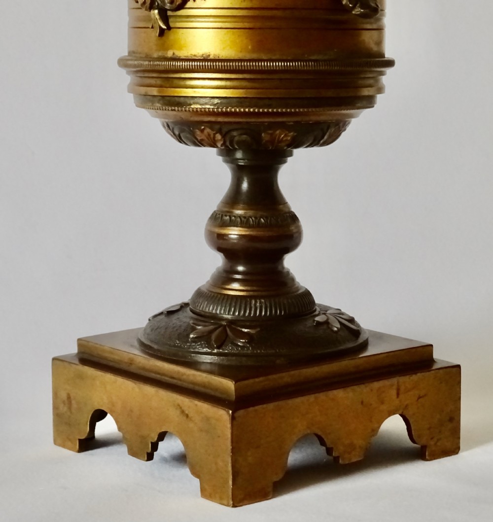 A PAIR OF VICTORIAN BRONZE CHERUB VASES View IV