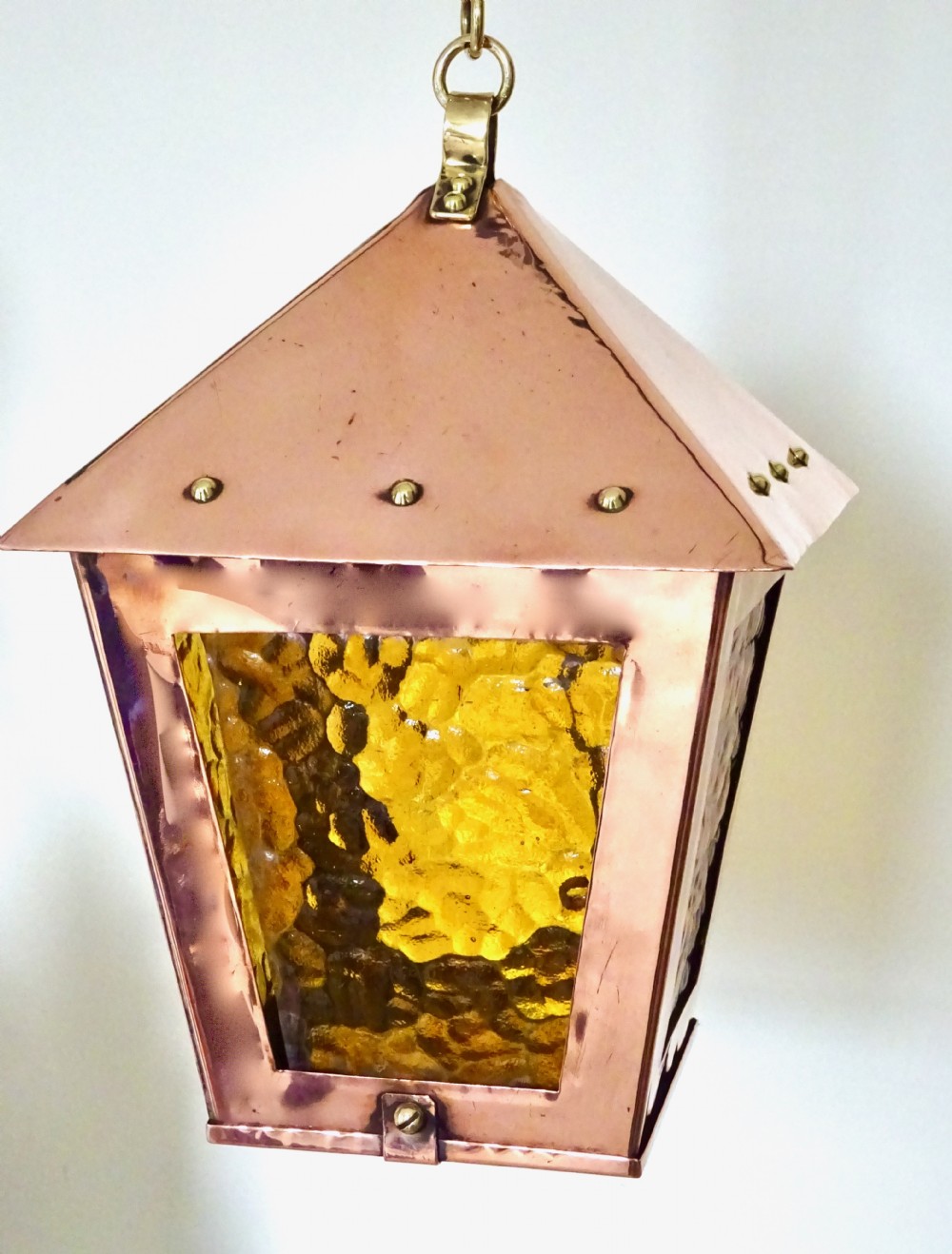 A SMALL COPPER AND BRASS LANTERN