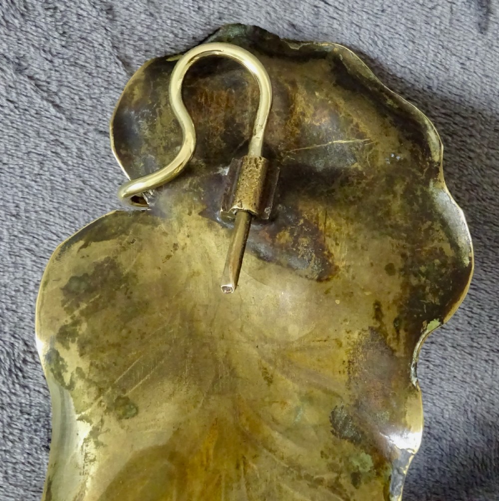 A PAIR OF ART NOUVEAU BRASS CANDLE SCONCES View III