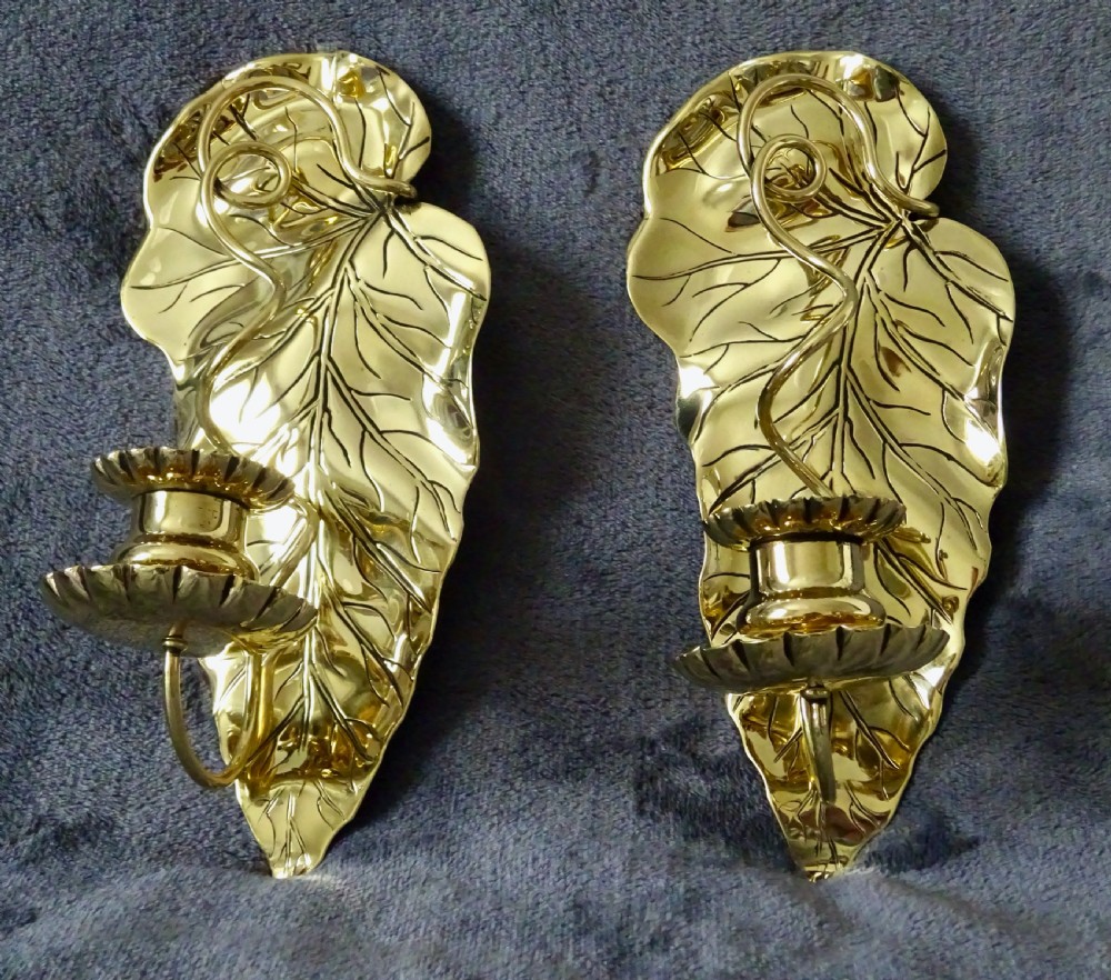 A PAIR OF ART NOUVEAU BRASS CANDLE SCONCES View V