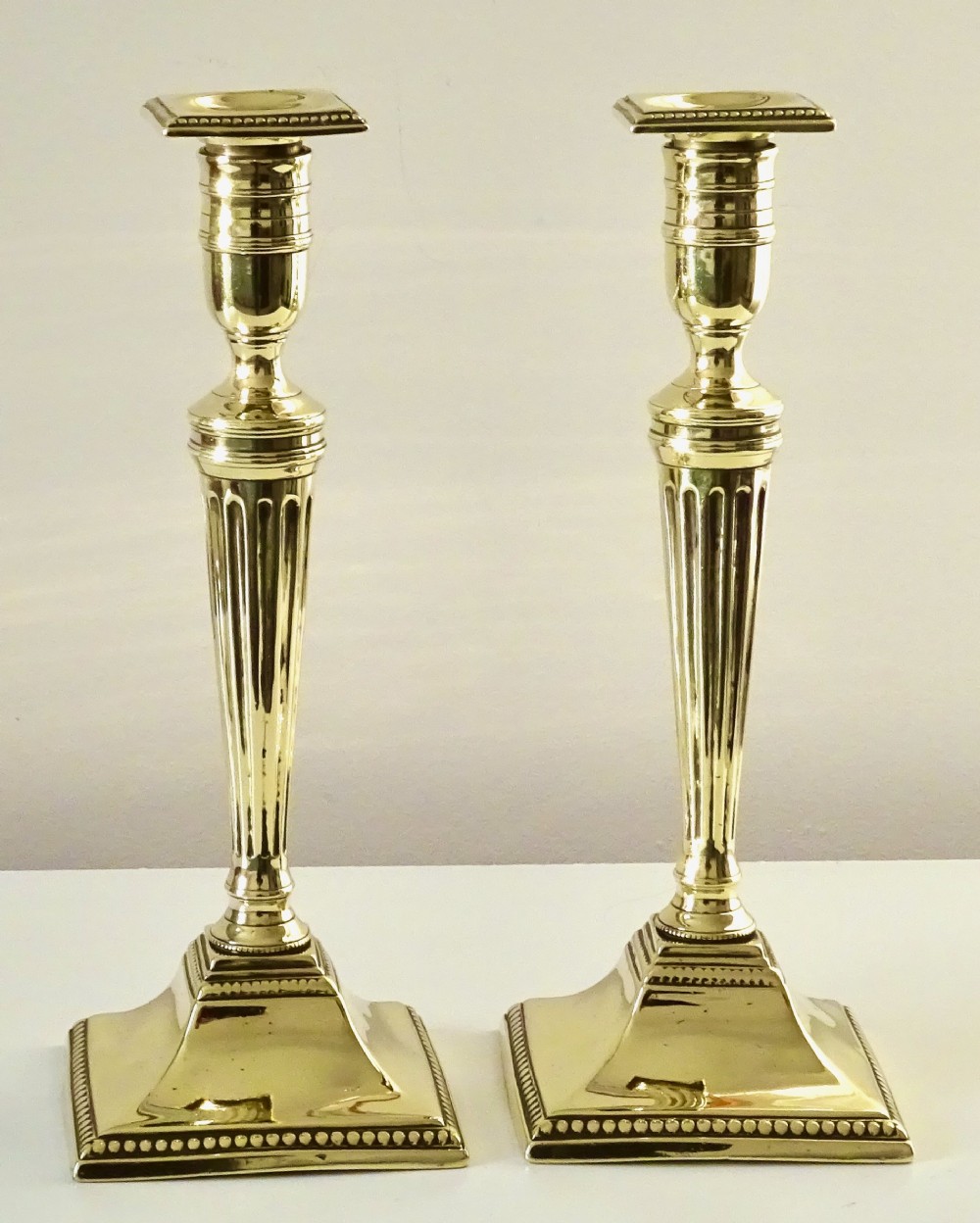 PAIR LATE VICTORIAN BRASS CANDLESTICKS