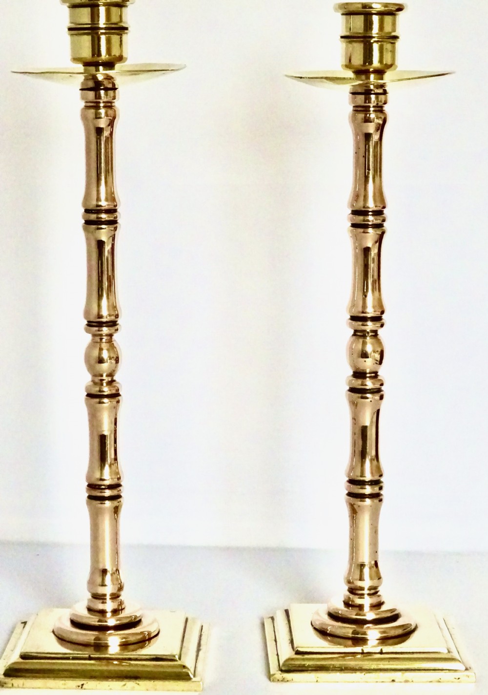 PAIR VICTORIAN BRONZE AND BRASS CANDLESTICKS View II