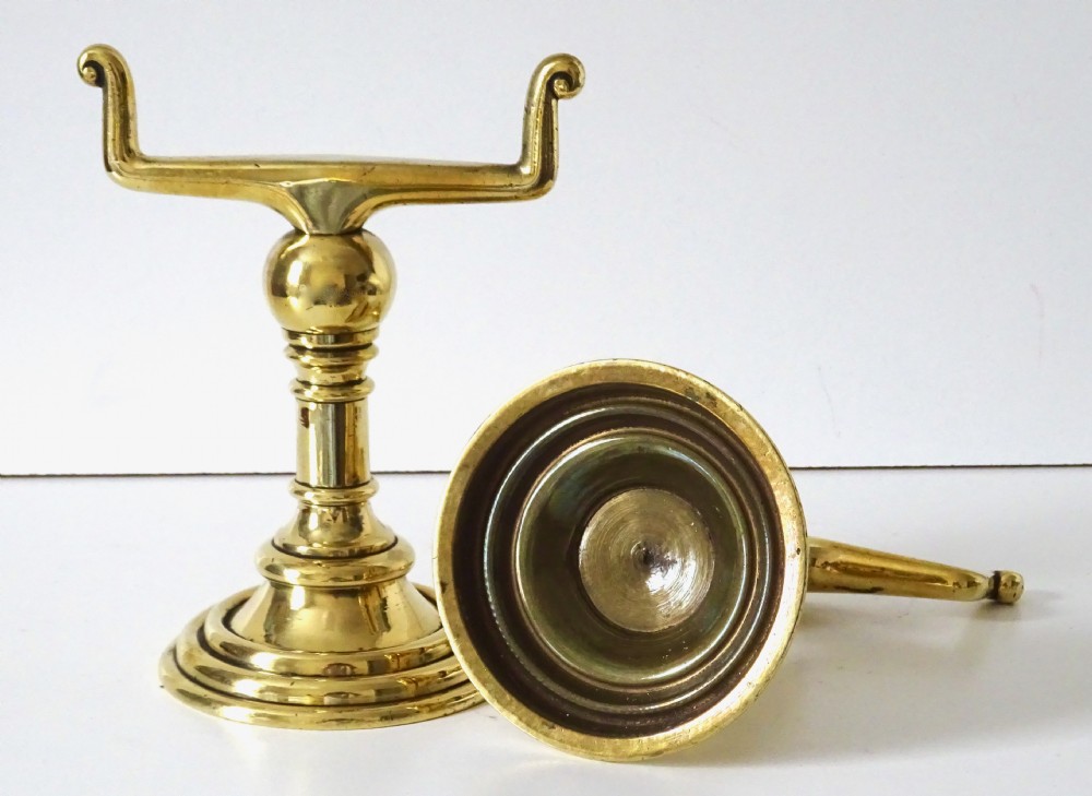 A PAIR OF HEAVY, SOLID BRASS FIRE DOGS View II