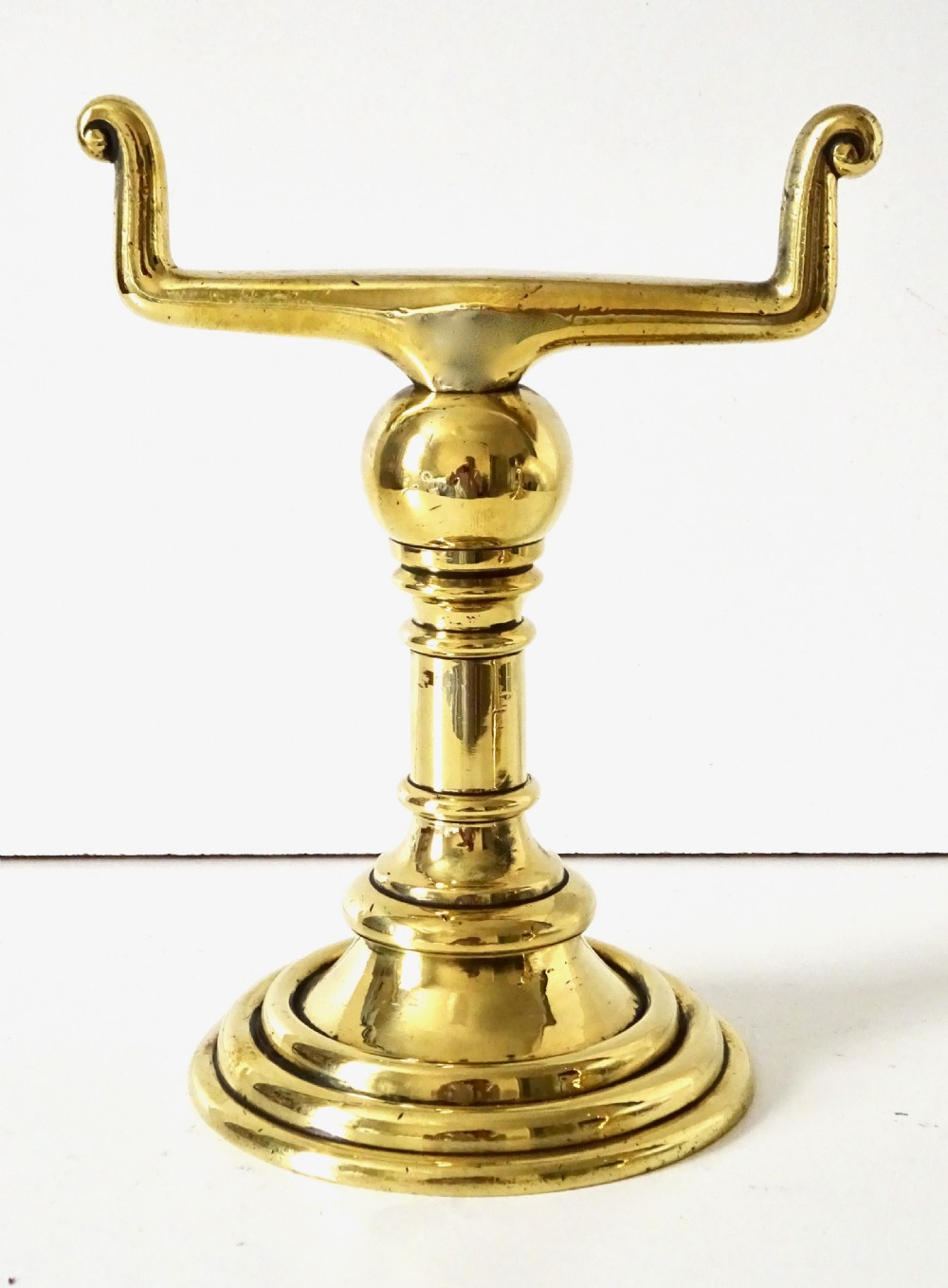 A PAIR OF HEAVY, SOLID BRASS FIRE DOGS View III