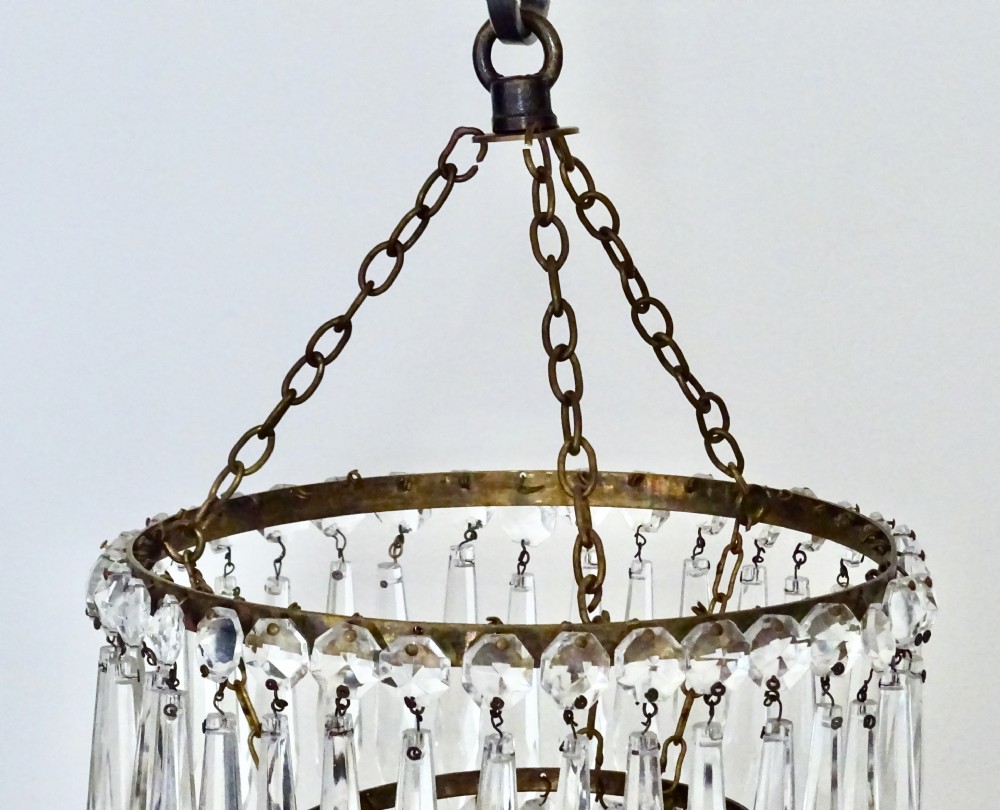A THREE TIER GLASS DROP CEILING LIGHT View II