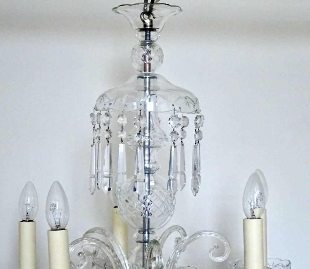 A FIVE ARM GLASS CHANDELIER View VI