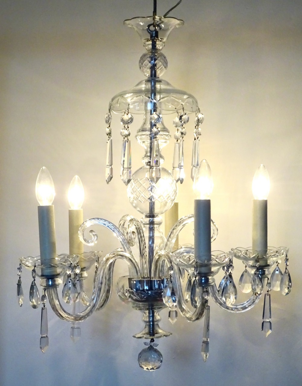 A FIVE ARM GLASS CHANDELIER View IX