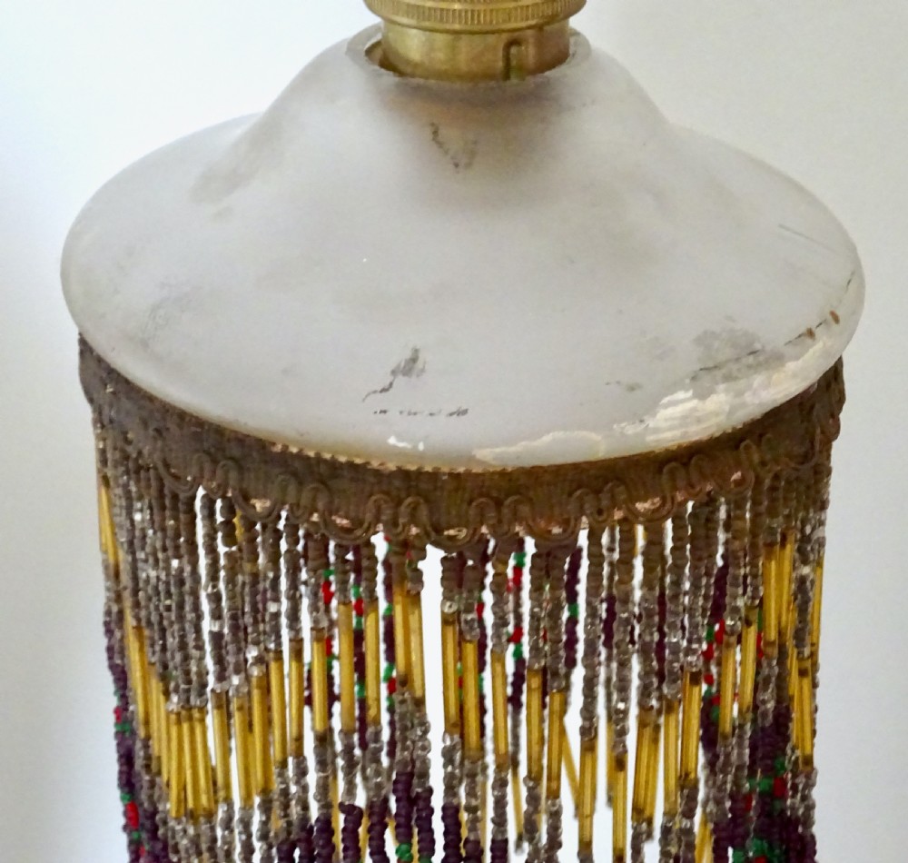 AN ORIGINAL BEADED LAMPSHADE WITH ORIGINAL OPAQUE GLASS TOP View V