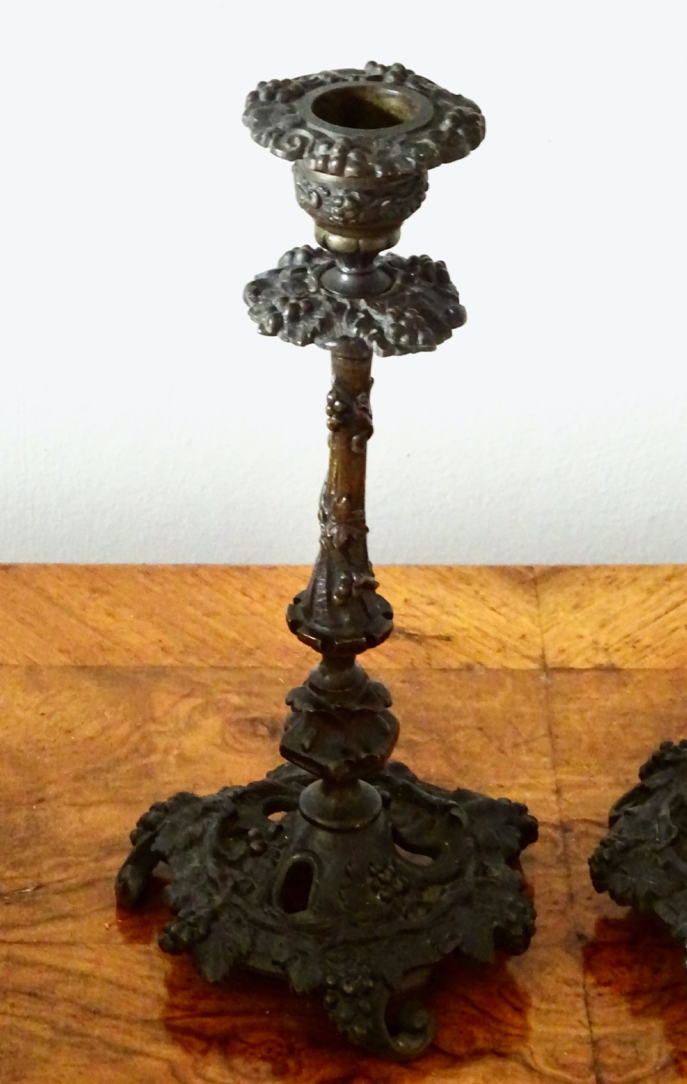 A PAIR OF VICTORIAN BRONZE CANDLESTICKS View VI
