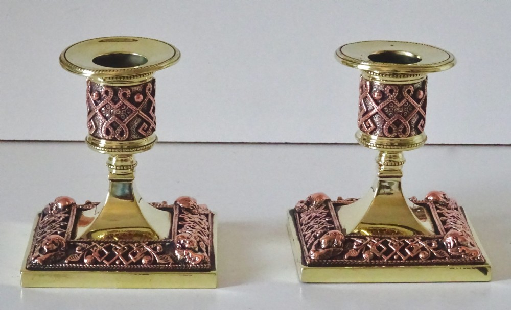 PAIR OF BRASS AND COPPER FILIGREE CANDLESTICKS View II