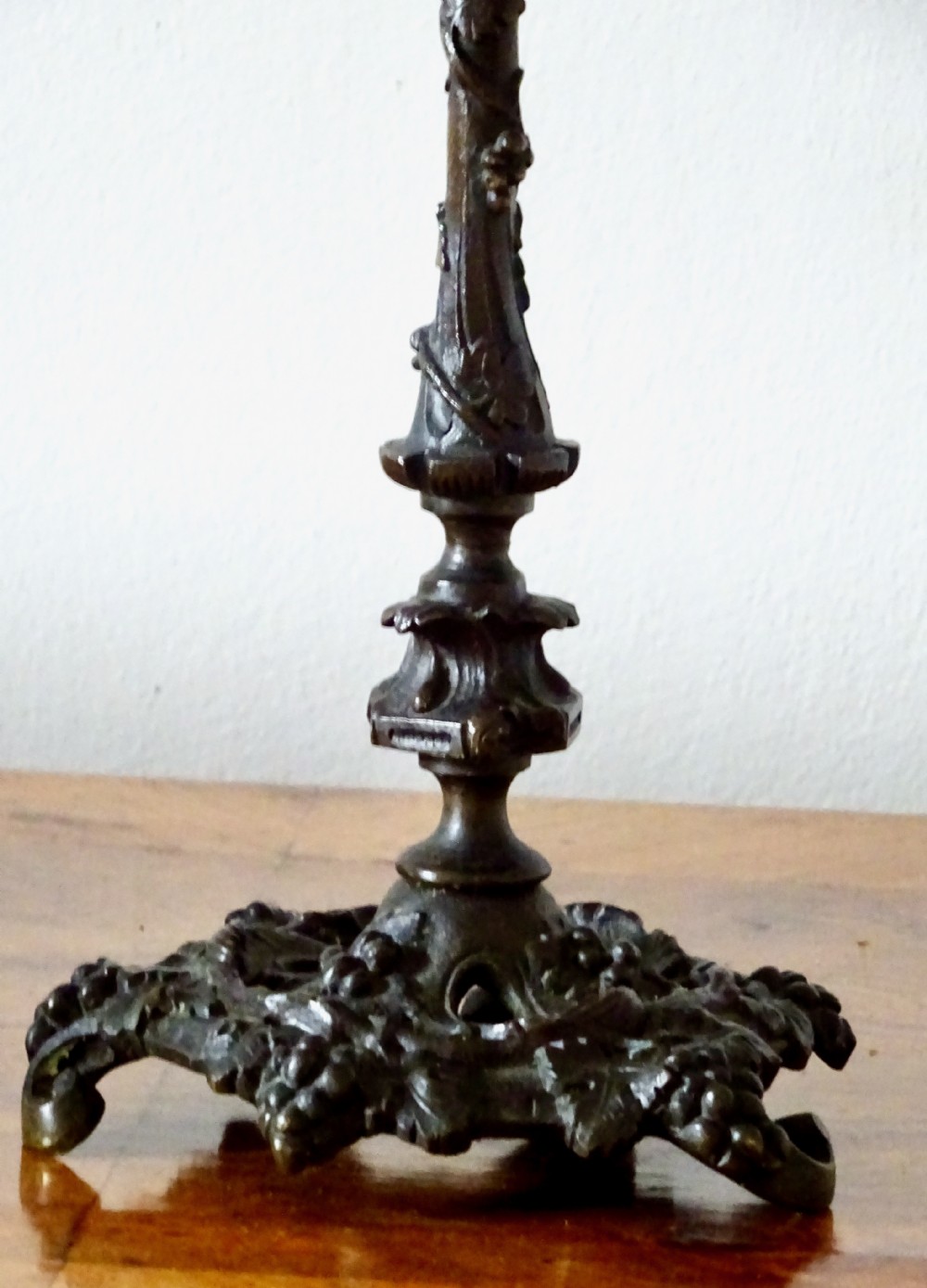 A PAIR OF VICTORIAN BRONZE CANDLESTICKS View IX