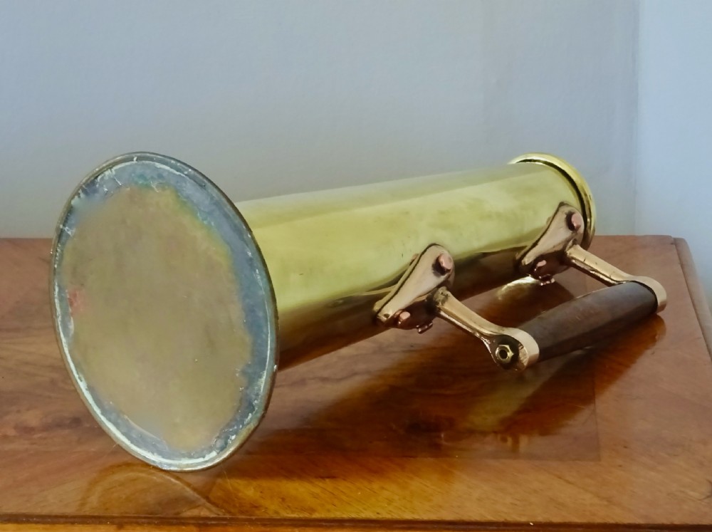 A BRASS AND BRONZE HYDROMETER JUG View V
