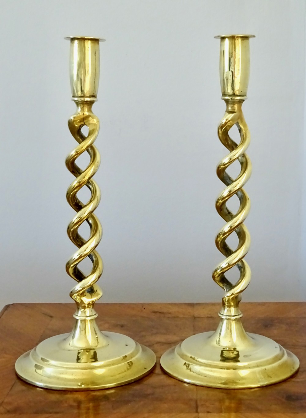 PAIR BRASS OPEN TWIST TALL CANDLESTICKS