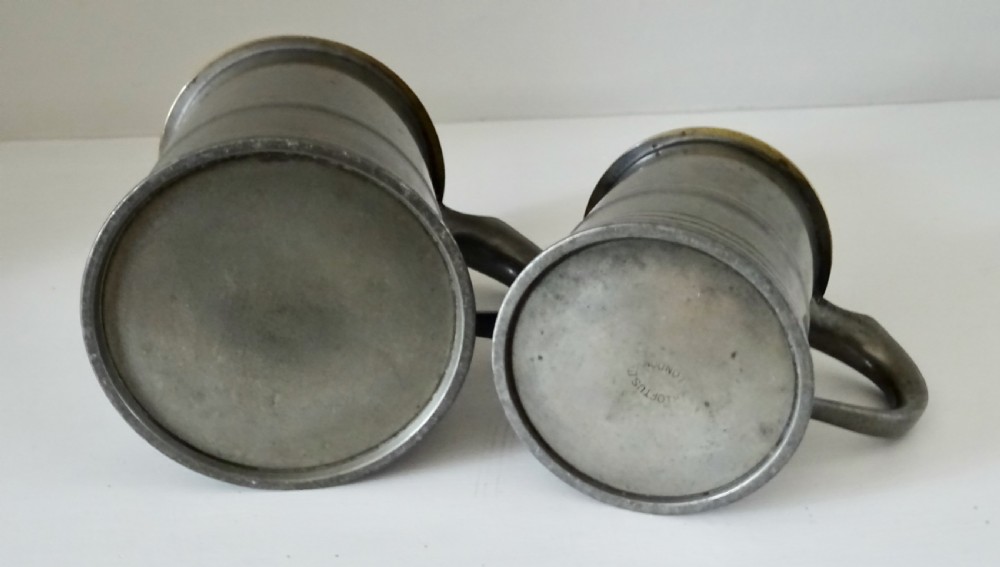 TWO LOFTUS PEWTER TANKARDS WITH BRASS RIMS View V