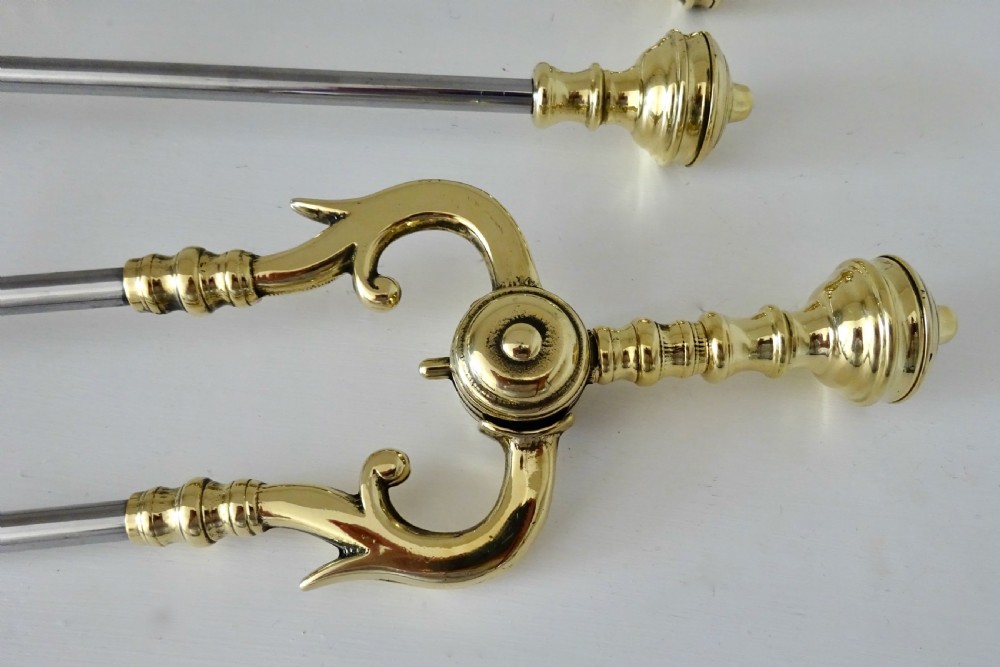 SET OF STEEL AND BRASS FIRE IRONS View V