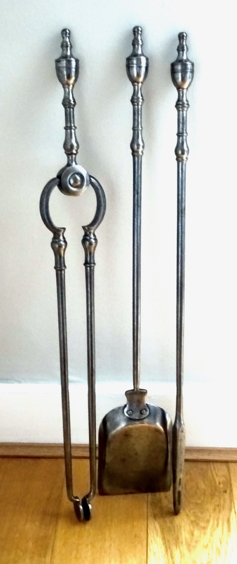 CIRCA 1900 A SET OF STEEL FIRE IRONS