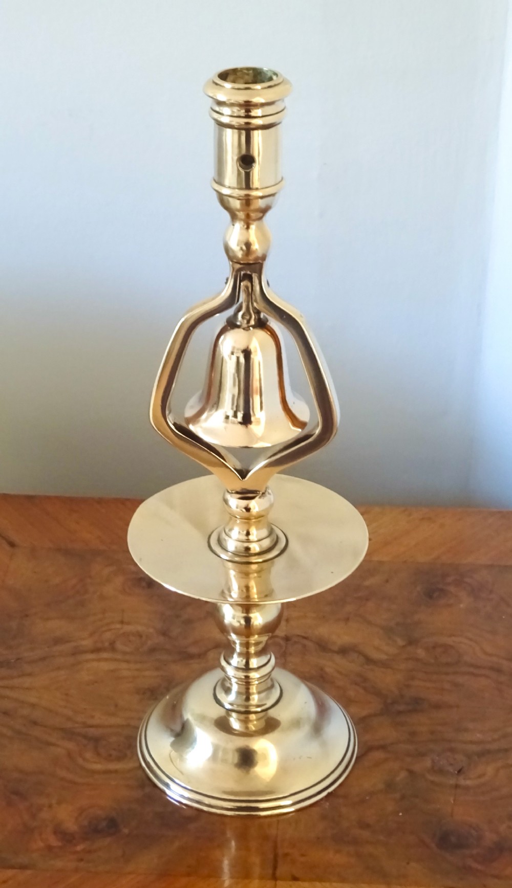 BRONZE TAVERN CANDLESTICK WITH BELL