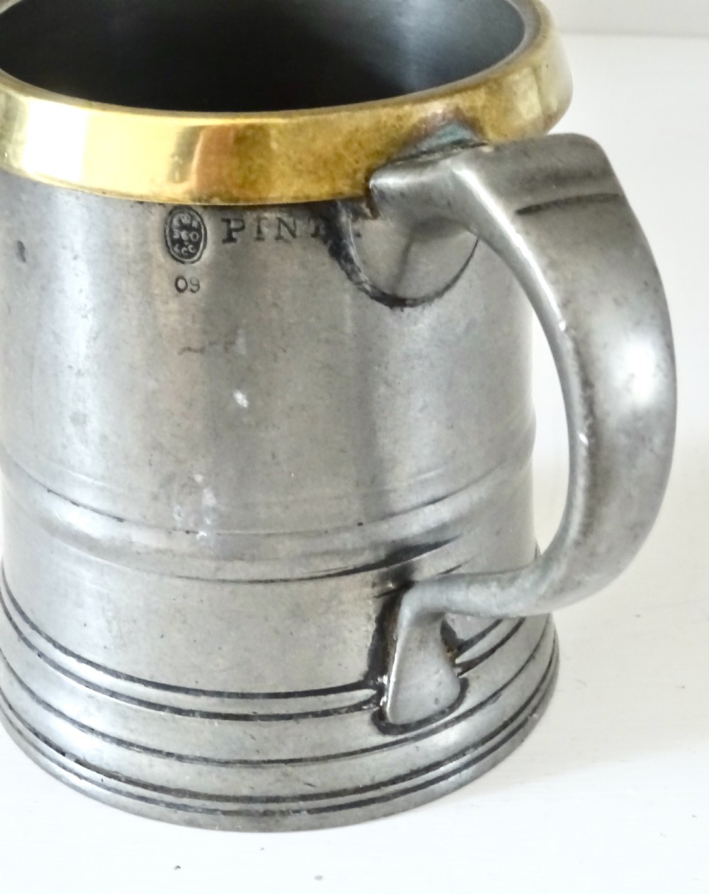TWO LOFTUS PEWTER TANKARDS WITH BRASS RIMS View IV