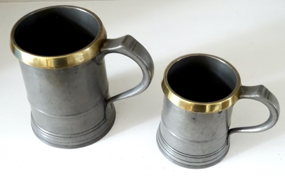 TWO LOFTUS PEWTER TANKARDS WITH BRASS RIMS View VI