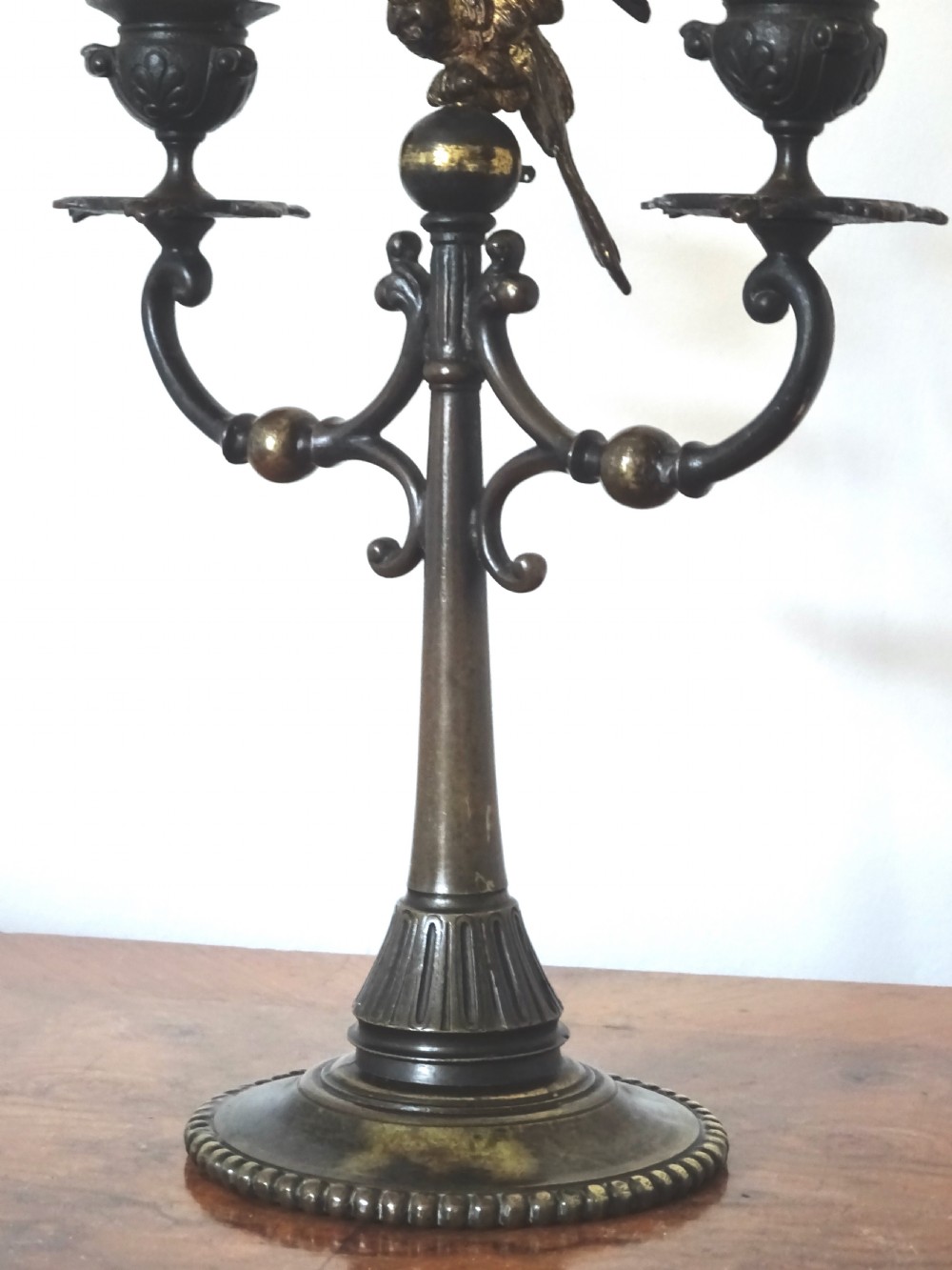 BRONZE CANDLESTICK WITH A PARROT ON THE TOP View III