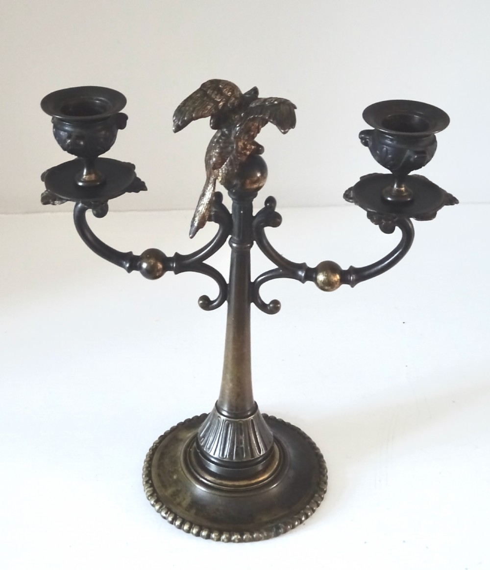 BRONZE CANDLESTICK WITH A PARROT ON THE TOP View IV